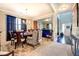 Elegant dining room with natural light, hardwood floors, and comfortable seating at 345 Piedmont Cir, Covington, GA 30016