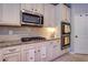 Modern kitchen featuring granite countertops and stainless steel appliances at 345 Piedmont Cir, Covington, GA 30016