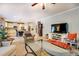 Comfortable living room area offering plenty of seating, entertainment center, and an open floor plan at 345 Piedmont Cir, Covington, GA 30016