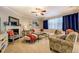 Cozy living area featuring a fireplace, plush seating, and elegant decor at 345 Piedmont Cir, Covington, GA 30016