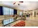 Spacious living room featuring an open layout, tile floors, and natural lighting at 345 Piedmont Cir, Covington, GA 30016