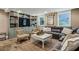 Cozy basement living room with a large sectional sofa and built-in shelving at 901 United Se Ave, Atlanta, GA 30316