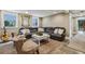 Basement with a large sectional sofa and a white coffee table on a neutral rug at 901 United Se Ave, Atlanta, GA 30316