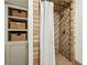 Bathroom shower alcove with decorative tile, complimented by built in storage at 901 United Se Ave, Atlanta, GA 30316