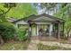 Charming cottage-style home with a covered porch and brick walkway at 901 United Se Ave, Atlanta, GA 30316