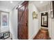 Hallway with a rustic sliding barn door and decor, enhanced by a long runner rug at 901 United Se Ave, Atlanta, GA 30316