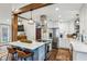 Stylish kitchen with a center island, stainless appliances, and modern lighting at 901 United Se Ave, Atlanta, GA 30316