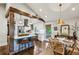Modern kitchen with white cabinets, stainless steel appliances, and a breakfast bar at 901 United Se Ave, Atlanta, GA 30316
