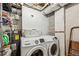 This laundry room features a Samsung washer and dryer and lots of storage space at 901 United Se Ave, Atlanta, GA 30316