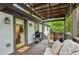 Relaxing covered porch with swing, grill, and outdoor seating perfect for entertaining at 901 United Se Ave, Atlanta, GA 30316