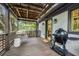 Inviting outdoor patio featuring a porch swing, grill and plenty of room for outdoor entertaining at 901 United Se Ave, Atlanta, GA 30316