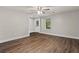 Bright living room showcasing wood-look floors, neutral walls, and a view of the front door at 1939 Dunlap Ave, Atlanta, GA 30344