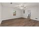 Spacious living room featuring wood-look floors, neutral walls, and ample natural light at 1939 Dunlap Ave, Atlanta, GA 30344