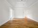 Bedroom featuring hardwood floors, neutral walls, and white trim at 2419 Boulder Se Rd, Atlanta, GA 30316