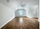 Attic bonus room with vaulted ceilings, hardwood floors, neutral walls, and a fan at 2419 Boulder Se Rd, Atlanta, GA 30316