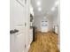 Spacious kitchen with stainless steel appliances, sleek cabinets, and hardwood floors perfect for modern living at 2419 Boulder Se Rd, Atlanta, GA 30316