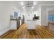 Modern kitchen with stainless steel appliances, sleek white cabinets, and a functional island for culinary enthusiasts at 2419 Boulder Se Rd, Atlanta, GA 30316