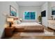 Serene bedroom featuring a plush queen bed, side tables, modern decor, and soft lighting for a cozy retreat at 2419 Boulder Se Rd, Atlanta, GA 30316