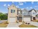 Beautiful new construction two-story home featuring a two-car garage and a welcoming entrance at 4011 Redan Rd # 7, Stone Mountain, GA 30083