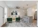 Bright living room open to kitchen and featuring stylish flooring and modern ceiling fan at 4011 Redan Rd # 7, Stone Mountain, GA 30083