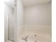 Clean bathroom featuring a bathtub and shower stall at 263 Austin Rd, Stockbridge, GA 30281