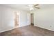 Bedroom featuring a carpet, and access to a private bathroom and closet at 263 Austin Rd, Stockbridge, GA 30281