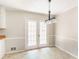 Dining room featuring paneled doors and accent lighting at 263 Austin Rd, Stockbridge, GA 30281