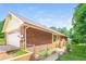 Charming single-story brick home with attached garage and well-maintained lawn and landscaping at 263 Austin Rd, Stockbridge, GA 30281