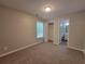 Comfortable bedroom with closet, window, and bathroom views at 3838 Glenlake Springs Nw Ct, Kennesaw, GA 30144
