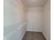 Walk-in closet featuring built-in wire shelving for easy storage and organization at 3838 Glenlake Springs Nw Ct, Kennesaw, GA 30144