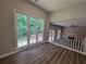 Living space with large windows, vaulted ceilings, and open view to the living room at 3838 Glenlake Springs Nw Ct, Kennesaw, GA 30144
