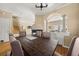 Spacious dining area showcasing stairs, neutral walls, and hardwood floors at 59 Townview Dr, Alpharetta, GA 30022