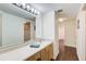 Bathroom vanity with a large mirror and ample lighting at 199 14Th St # 409, Atlanta, GA 30309
