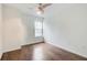 Bright bedroom features a ceiling fan, wood floors, and a window offering natural light at 199 14Th St # 409, Atlanta, GA 30309