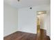 Bedroom with hardwood floors and an open doorway to another room at 199 14Th St # 409, Atlanta, GA 30309