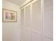 Closet with bi-fold doors and artwork on the wall at 199 14Th St # 409, Atlanta, GA 30309
