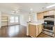Well-lit kitchen area with open layout and modern appliances at 199 14Th St # 409, Atlanta, GA 30309