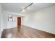 Spacious living room with hardwood flooring, natural light and modern lighting fixtures at 199 14Th St # 409, Atlanta, GA 30309