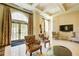 Common room offering lounge seating with French doors leading to an outdoor space at 199 14Th St # 409, Atlanta, GA 30309