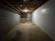 Unfinished basement with concrete walls at 2184 River Acres Ct, Lithonia, GA 30058
