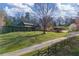 Beautiful cabin-style home with green metal roof and a long driveway at 3721 Mason Creek Rd, Winston, GA 30187