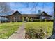 Charming log home with stone accents and a welcoming covered porch at 3721 Mason Creek Rd, Winston, GA 30187