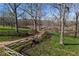 Rolling hills with a barn at the end of the path at 3721 Mason Creek Rd, Winston, GA 30187