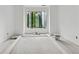 Bright room with a window showcasing views of outside at 388 Londonberry Road, Sandy Springs, GA 30327