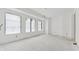 Bright bedroom featuring three large windows ready to be finished at 388 Londonberry Road, Sandy Springs, GA 30327