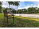 View of Equestrian Ring with a well maintained surface and bench in the foreground at 388 Londonberry Road, Sandy Springs, GA 30327