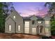 Magnificent new construction home featuring a neutral color palette and eye-catching black-trim windows at 388 Londonberry Road, Sandy Springs, GA 30327