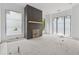 Bright living room showcasing modern fireplace and natural light at 388 Londonberry Road, Sandy Springs, GA 30327