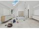 An elegant room with skylight, fireplace, and sleek cabinets offers a canvas for customized design at 388 Londonberry Road, Sandy Springs, GA 30327