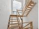 View of the unfinished wooden staircase leading to the second floor with natural light coming through the window at 388 Londonberry Road, Sandy Springs, GA 30327